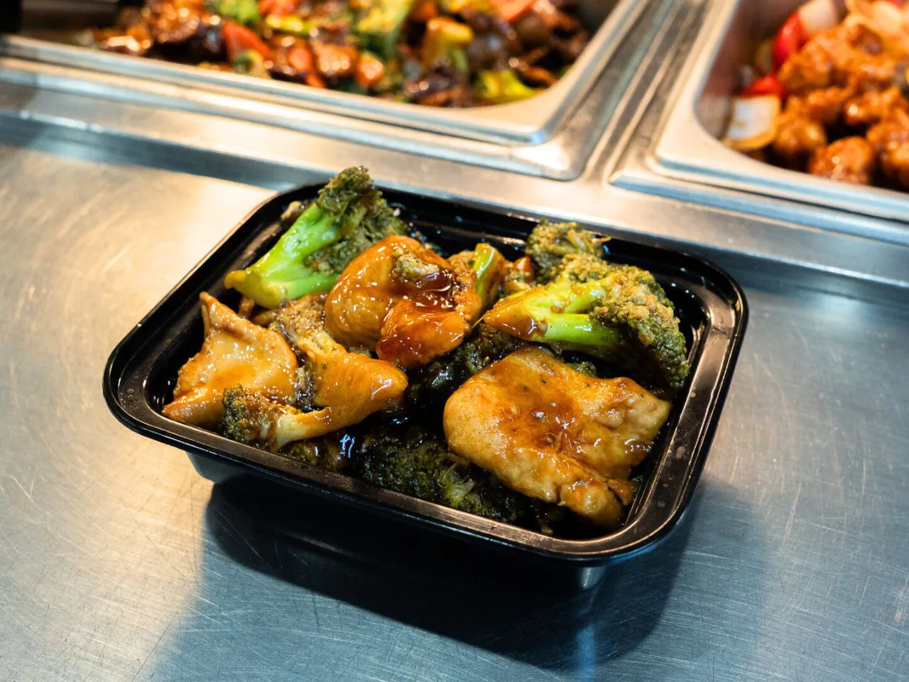 Stir-fried chicken and broccoli in savory brown sauce at Kennys Wok, a Chinese Restaurant in Philadelphia