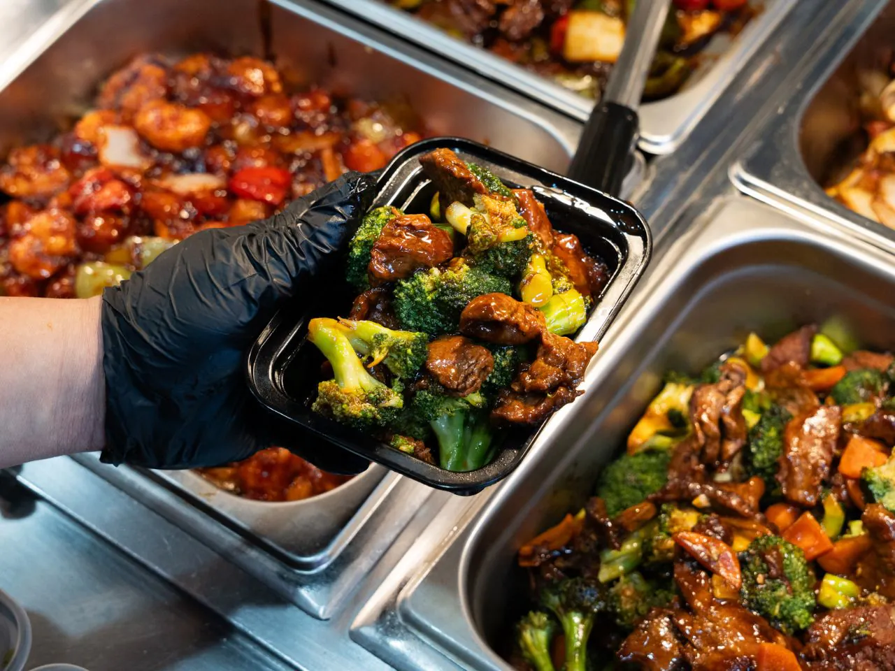 Stir-fried beef and broccoli in savory brown sauce at Kennys Wok, a Chinese Restaurant in Philadelphia