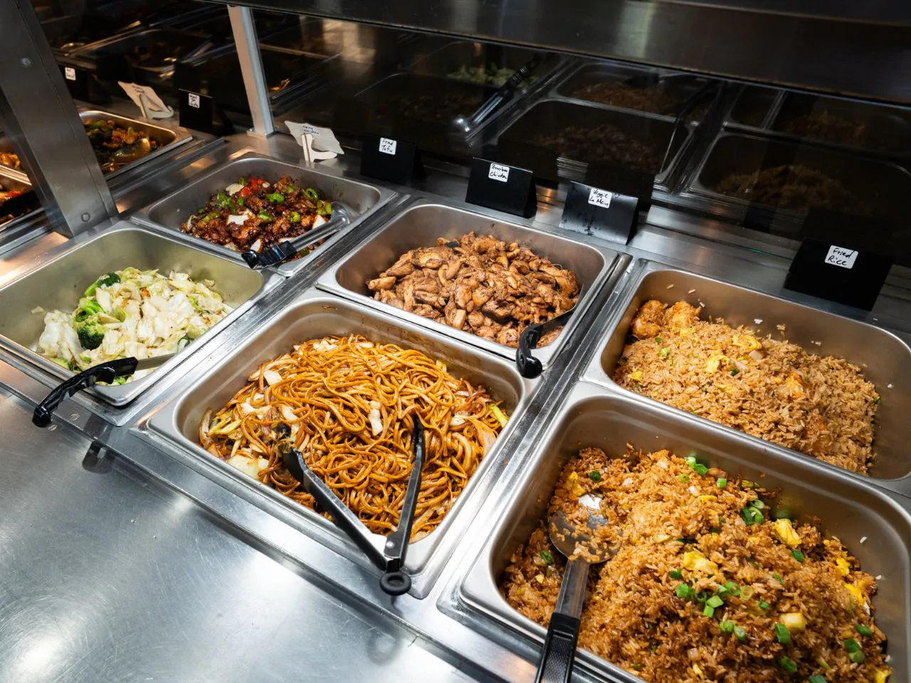 Buffet spread with chow mein, fried rice and assorted entrees at Kennys Wok, a Chinese Restaurant in Philadelphia
